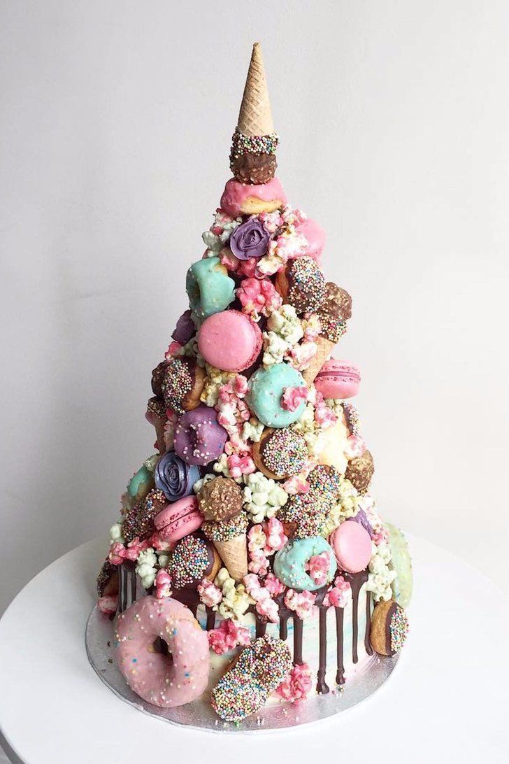 This_Wedding_Cake_Combines_Our_Favorite_Unicorn_Desserts_in_1_Magical_Masterpiece.jpg